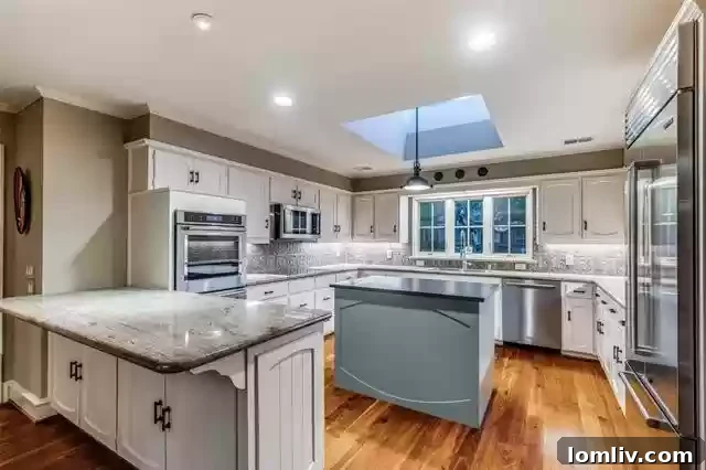 Modern Kitchen Design with Ample Counterspace and Oversized Skylight