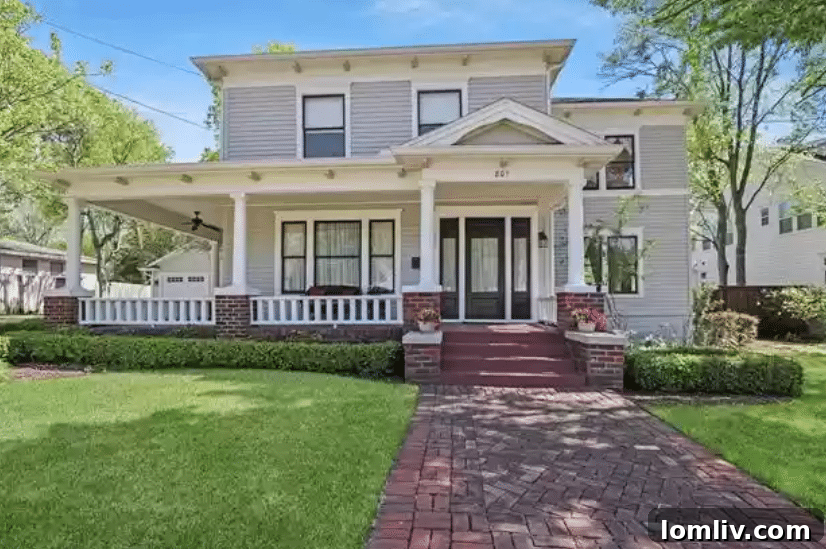 Charming historic Arts and Crafts home in McKinney with an expansive covered front porch.