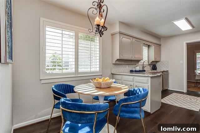 Charming Breakfast Nook Adjacent to Modern Kitchen