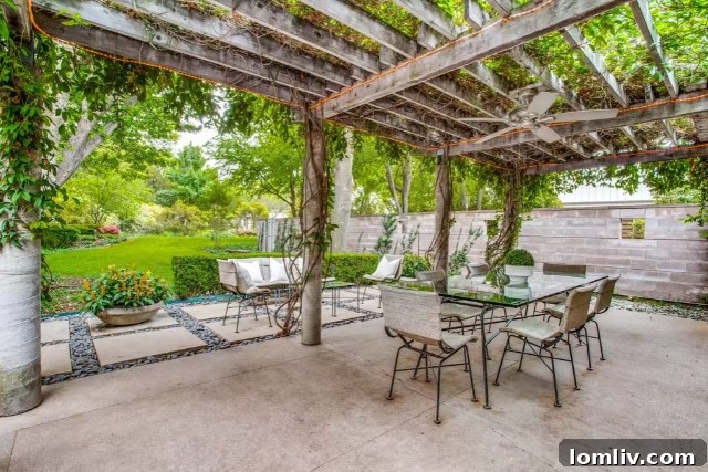 Trellis adorned with a flowering vine, recently added by Mark Domiteaux for the current owners