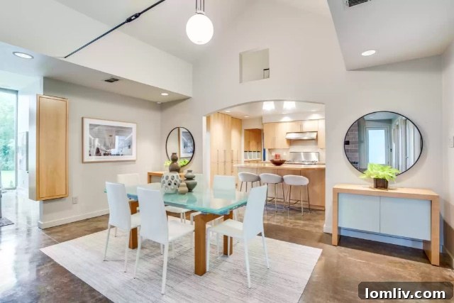 Interior view of a modern living area in the Domiteaux-designed home