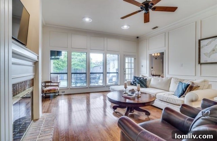 Inviting bedroom with natural light and wood floors in a Preston Highlands residence.