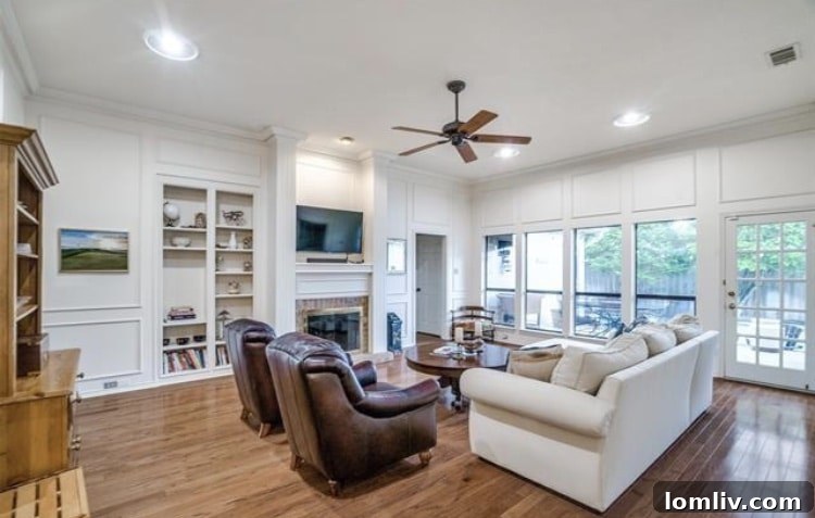Comfortable family room with a fireplace and ample space for gatherings.