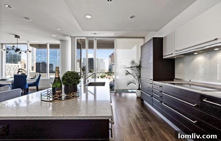 Modern high-rise condo in Victory Park Dallas with stunning floor-to-ceiling windows.