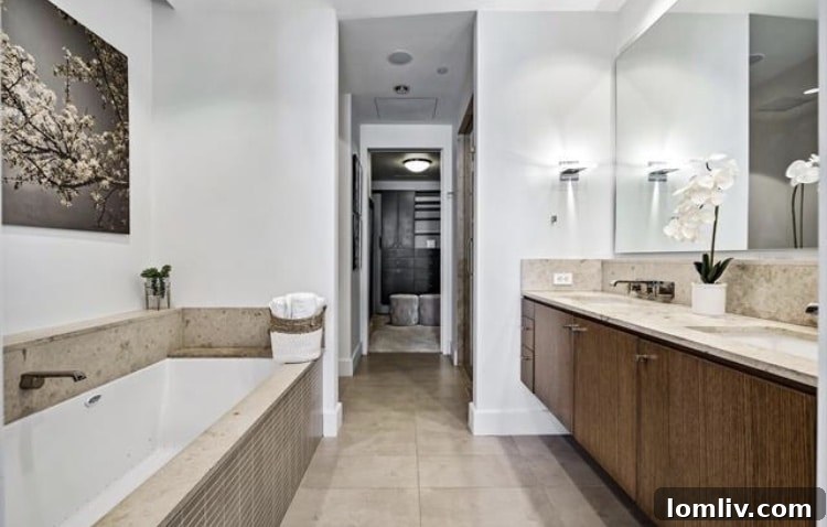 Elegant living area with city views in a Victory Park condo.