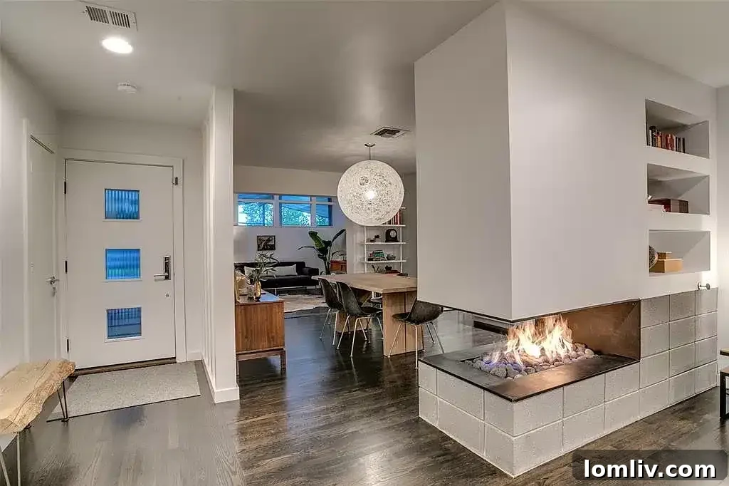 Cozy seating area with a distinctive fireplace and modern lighting fixtures