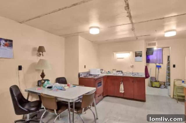 A Villain's Utopia Lex Luthor's Unlikely Haven 6 Interior view of the dining area in the underground Montana home with a practical, albeit uninspired, table