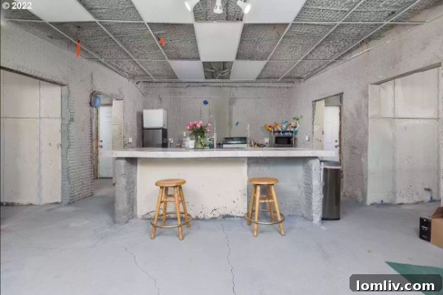 Spacious concrete room awaiting personalized decor