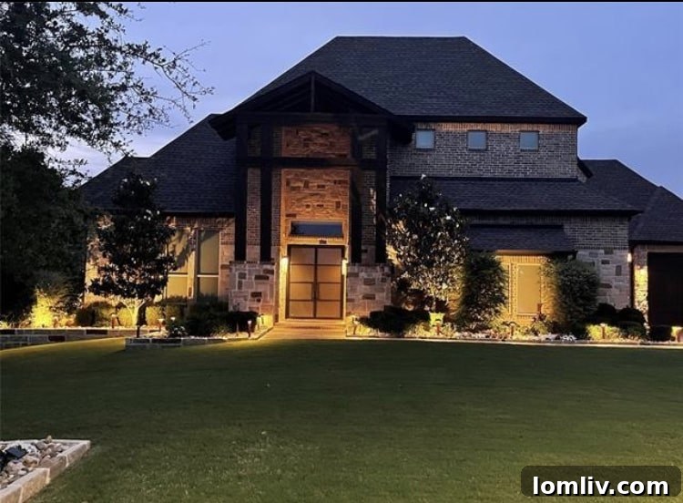 Modern custom home exterior with lush green surroundings in Lucas