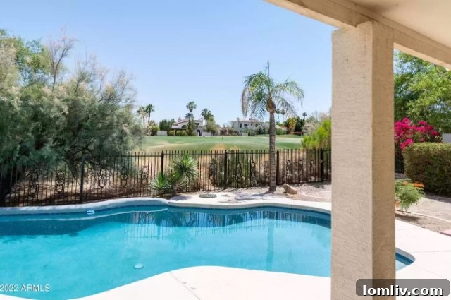 Backyard view of the Phoenix home overlooking a golf course