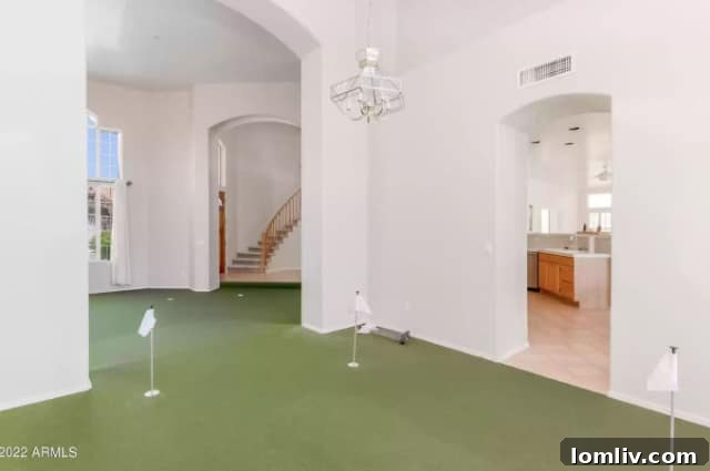 Spacious interior with an indoor putting green