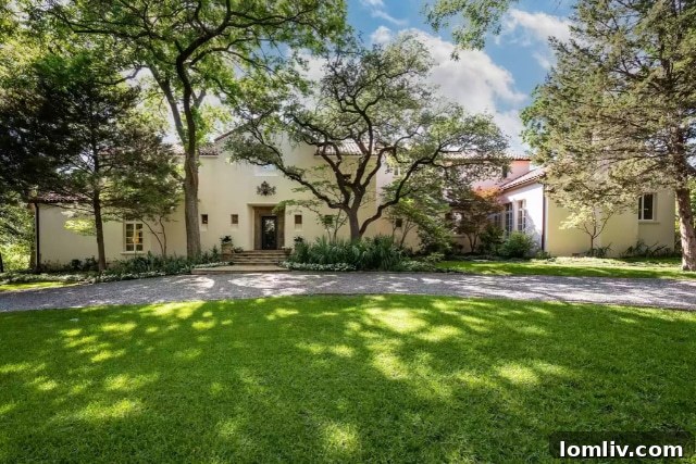 Elegant Andalusian style luxury home exterior at 9851 Rockbrook Drive, Dallas