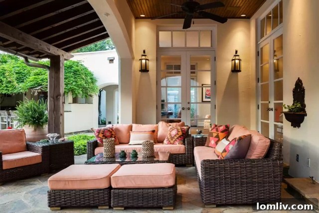 Serene covered verandah offering views of the lush gardens and pool