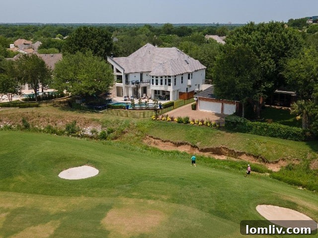 Aerial view of backyard, pool, and Mira Vista golf course