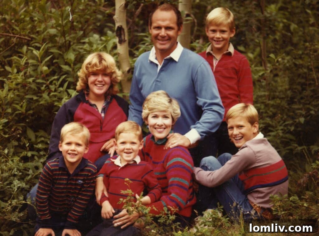 The Rhodes Family: Tom and Suzy, Courtney, Burton, Thomas, Patrick, and Dan share a moment together.