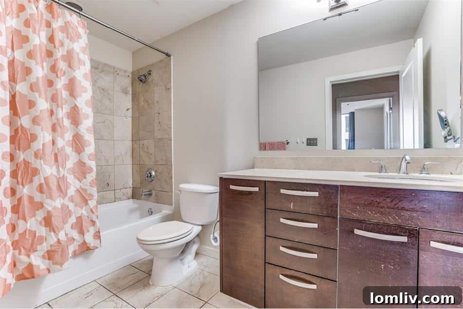Urban Elegance Redefined: A Highrise Haven in the City 6 A minimalist bedroom with expansive city views in a high-rise Dallas condo, ready for personalization.