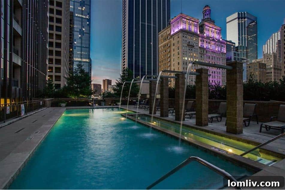 Urban Elegance Redefined: A Highrise Haven in the City 8 A versatile flex space in a Dallas condo, ideal for a home office or second bedroom, overlooking the city.