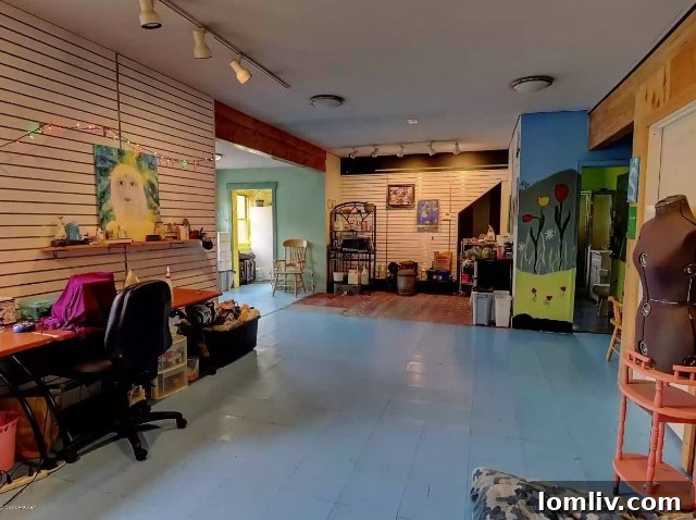 An interior wall of the Talkeetna home featuring unique, possibly DIY, decorative elements and vibrant colors.
