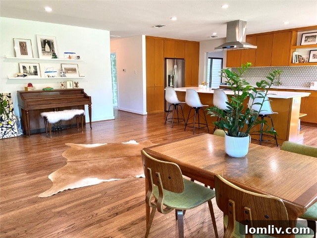 The Home Will Hook You, The Neighbors Will Win You Over 4 Exterior view of the updated 1950s Dallas home with a new porch