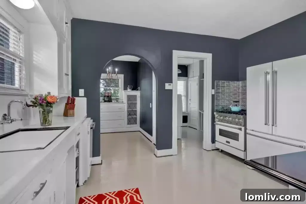 Stylish kitchen with high-end appliances and refreshed original cabinetry