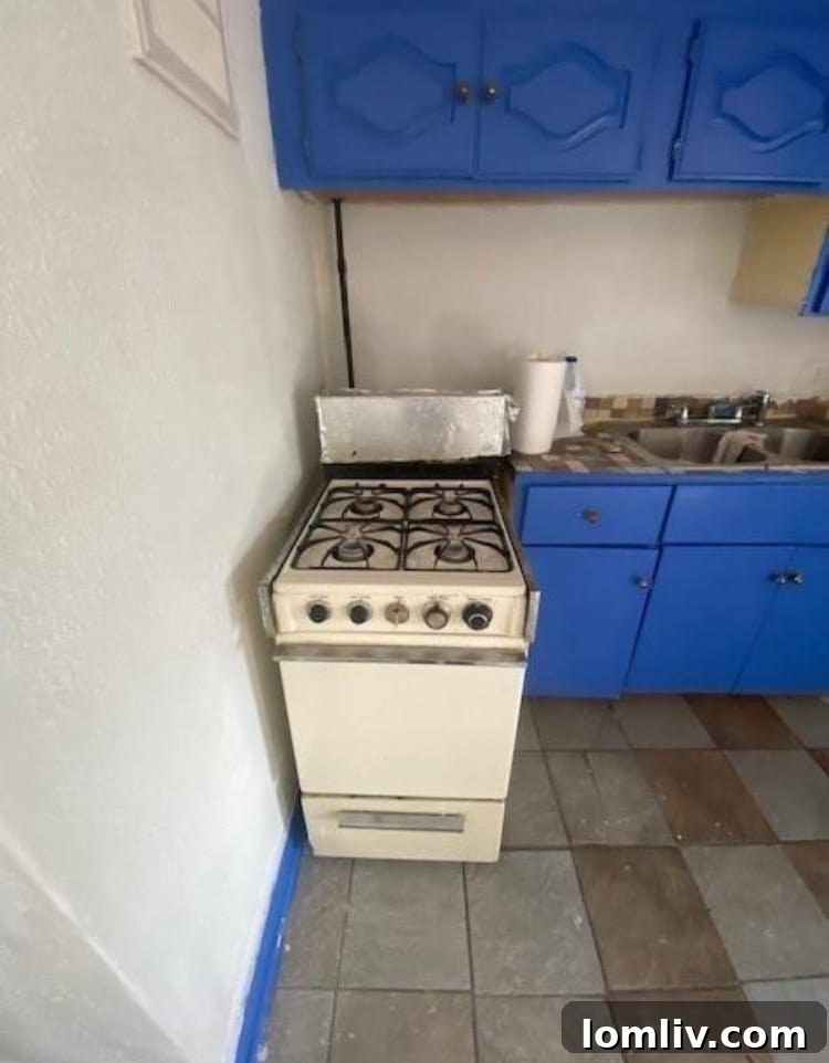 Kitchen showing severe damage at Reed-Manor
