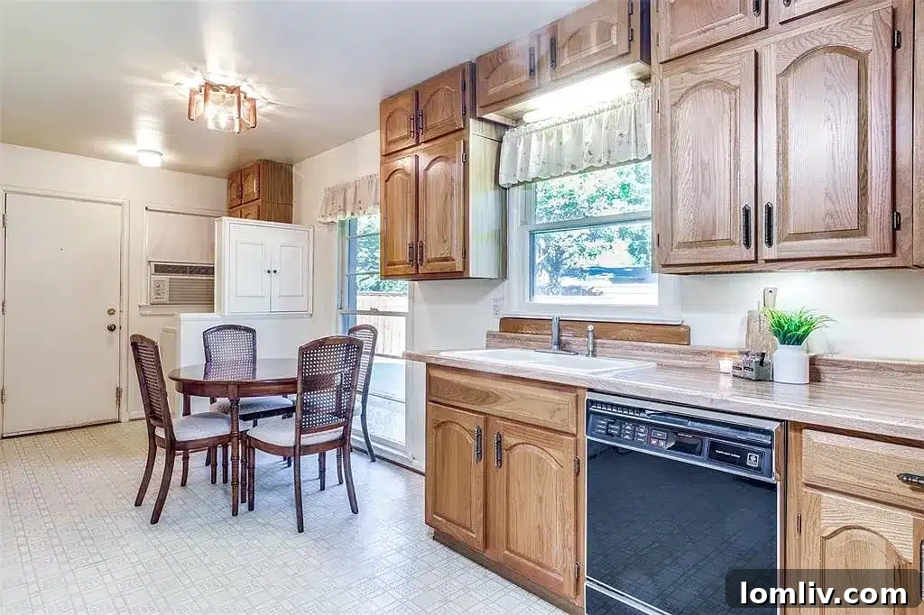 View of one of the bedrooms at 9922 Donegal Drive, featuring hardwood floors