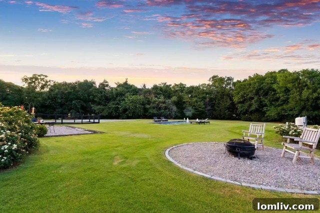 A serene view of the estate's landscape with grazing cattle, highlighting the harmonious blend of luxury and natural ranch life
