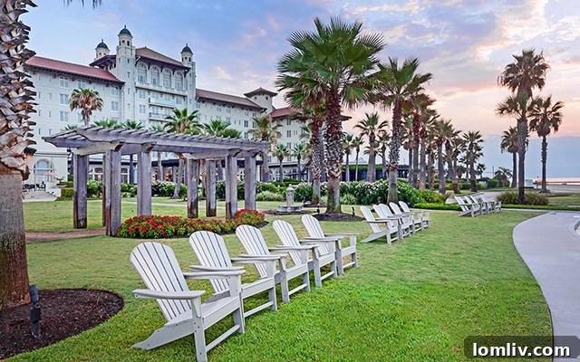 The lush grounds of the Grand Galvez, evoking an unexpected island paradise ambiance.