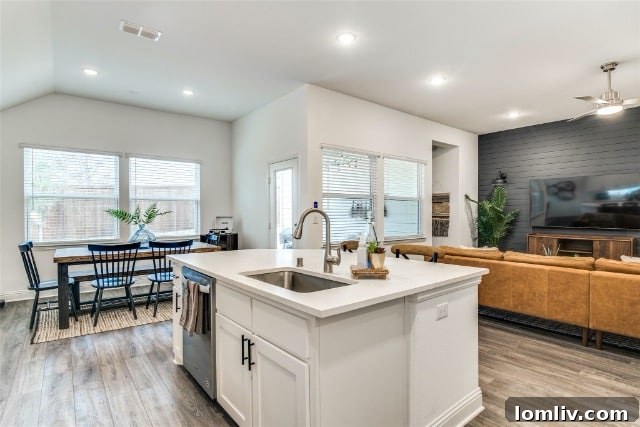 A tastefully decorated living area featuring modern furniture and subtle artistic touches.