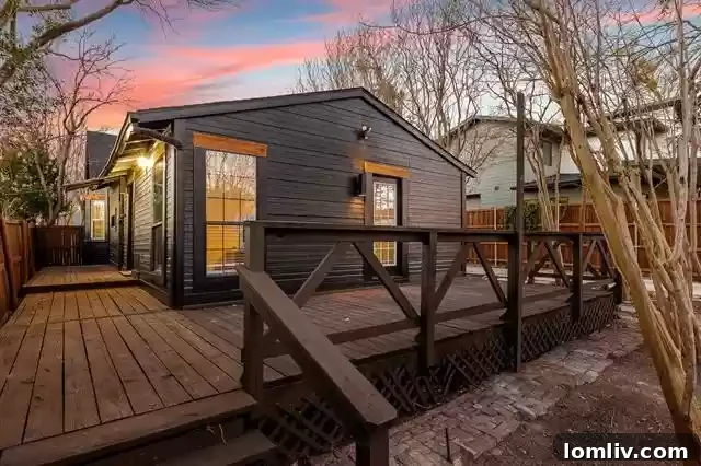 View of the cottage backyard and wrap-around porch