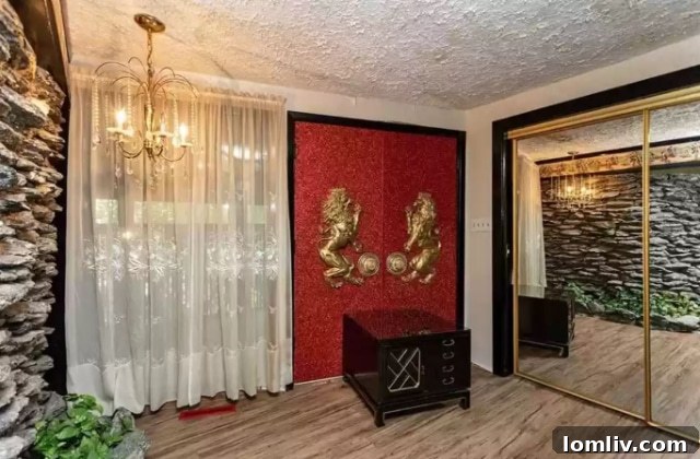 Midwest Oasis Shines with Las Vegas Glamour 4 Witness the striking, opulent golden lion front doors of this West Des Moines home, a bold statement defying typical Midwestern design conventions.