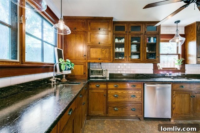 Gourmet kitchen featuring soapstone counters and cork floors
