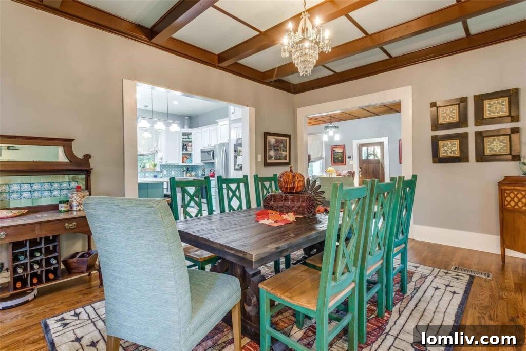 Open floor plan connecting parlor, dining room, and kitchen at 4500 Meadowbrook Drive