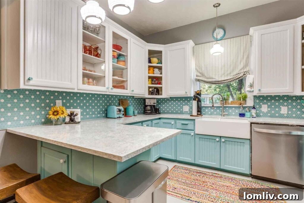 Modern kitchen with historic hex tile backsplash and seafoam blue cabinets