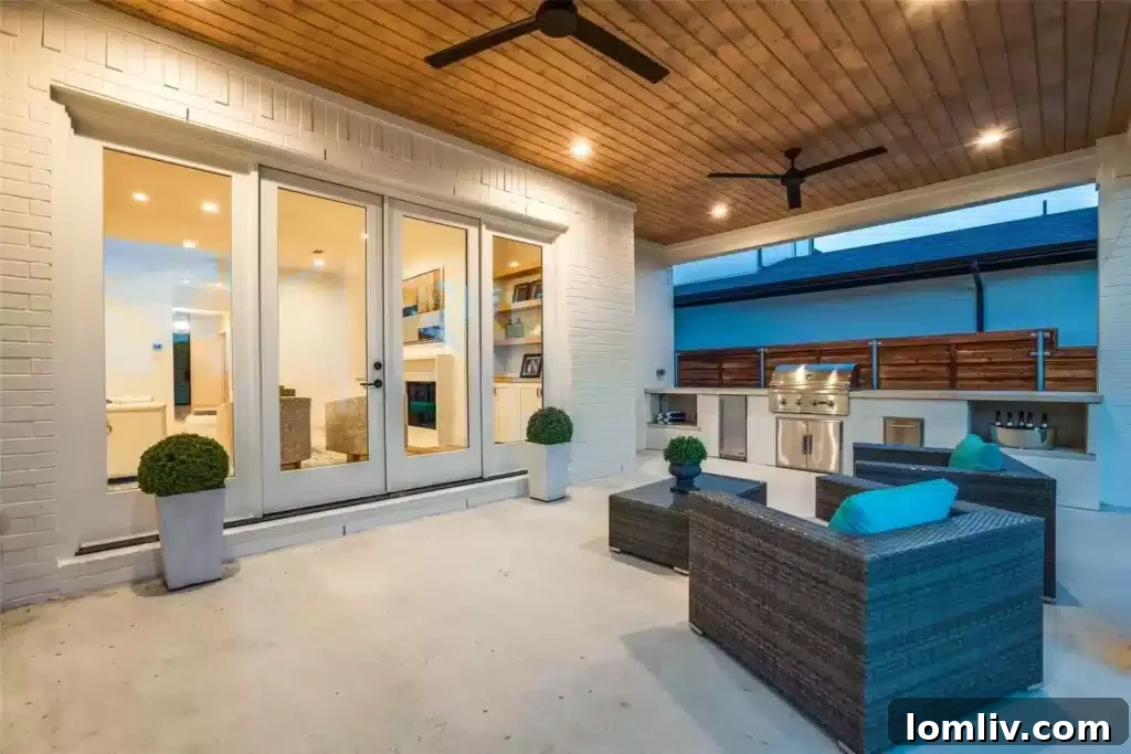Outdoor Living Area with Built-in Grill and Fridge