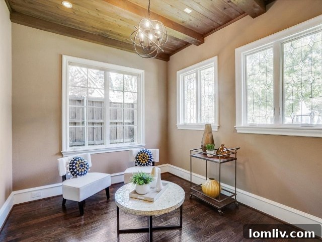 Elegant Living Room with Fireplace and View of Upper Level - 5354 Vanderbilt