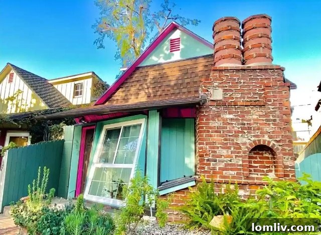The exterior of the quirky Burbank house, featuring mismatched windows and bold colors, evoking a playful yet chaotic design.