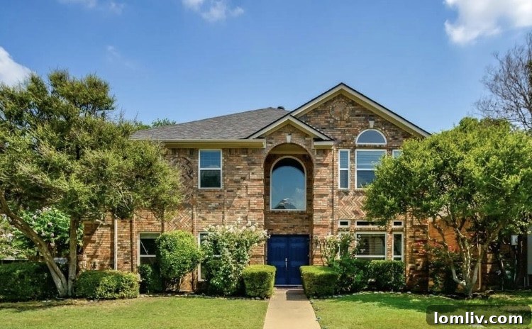 Attainable Opulence: Open Houses Under $1 Million This Week 14 Luxurious living room with a grand fireplace and elegant wood floors.