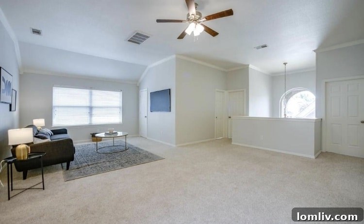 Attainable Opulence: Open Houses Under $1 Million This Week 15 Modern kitchen with stainless steel appliances and an island.