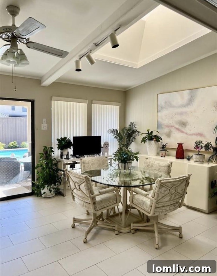 Attainable Opulence: Open Houses Under $1 Million This Week 4 Elegant living area with hardwood floors and ample natural light.