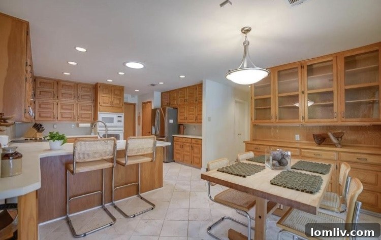 Attainable Opulence: Open Houses Under $1 Million This Week 8 Elegant formal dining room with expansive windows for natural light.