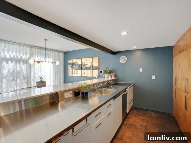 Interior view of a living space with vintage Midcentury Modern furniture and art