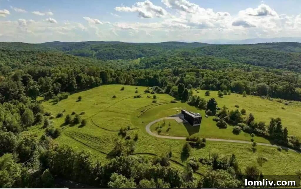 Expansive outdoor space of a luxury property, ideal for a dog run amidst natural surroundings.