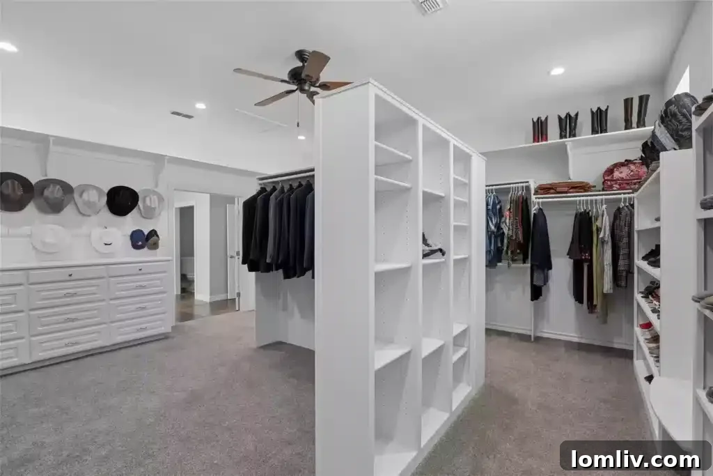 Massive Custom Walk-in Closet with Extensive Shelving and Storage in Burleson Primary Suite
