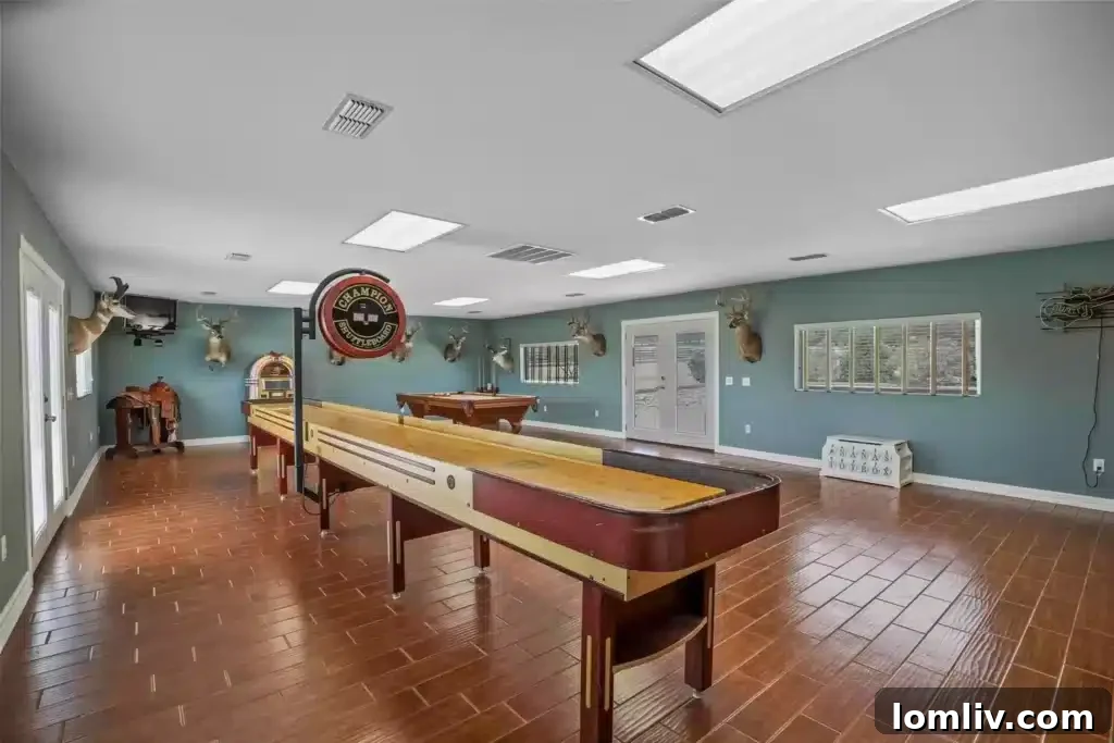 Dedicated Hallway Art Gallery with Picture Lighting in the Burleson Custom Home
