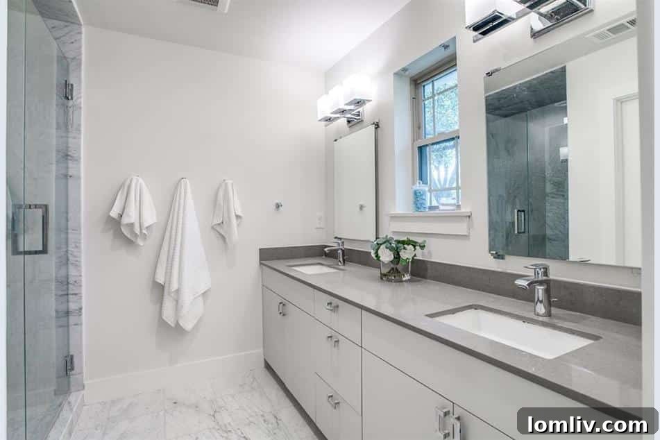 Midcentury's Fresh Modern Vibe 9 Modern Primary Bathroom with Dual Vanities, Marble, and Walk-In Shower