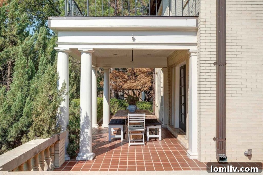 Inviting Front Porch and Architectural Details of a Ryan Place Villa, perfect for outdoor relaxation and entertaining