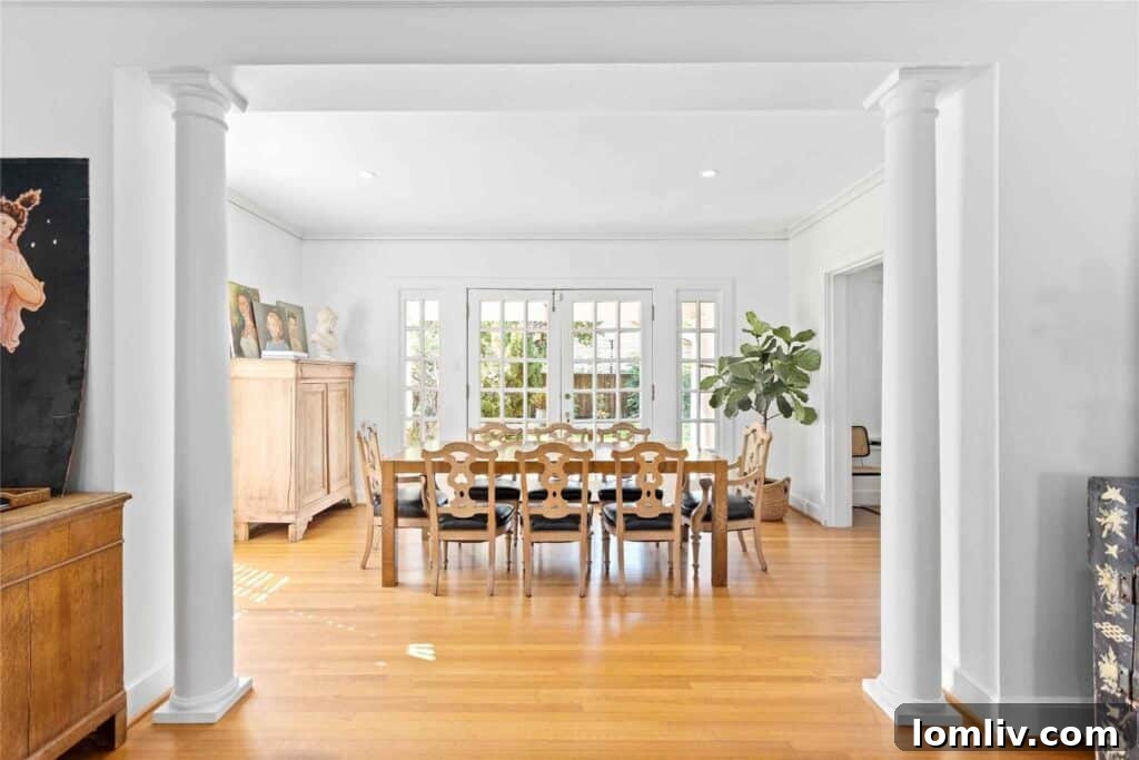Elegant Dining Area with Classical Tuscan Columns in a Historic Ryan Place House, perfect for entertaining