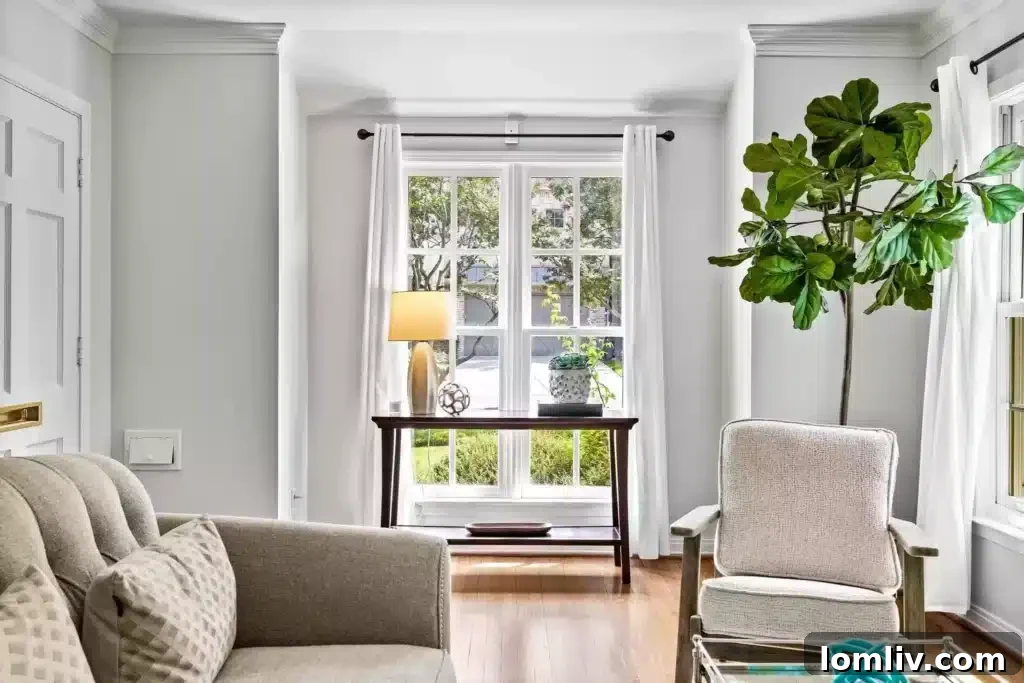 Bright and airy formal living room with original hardwood floors