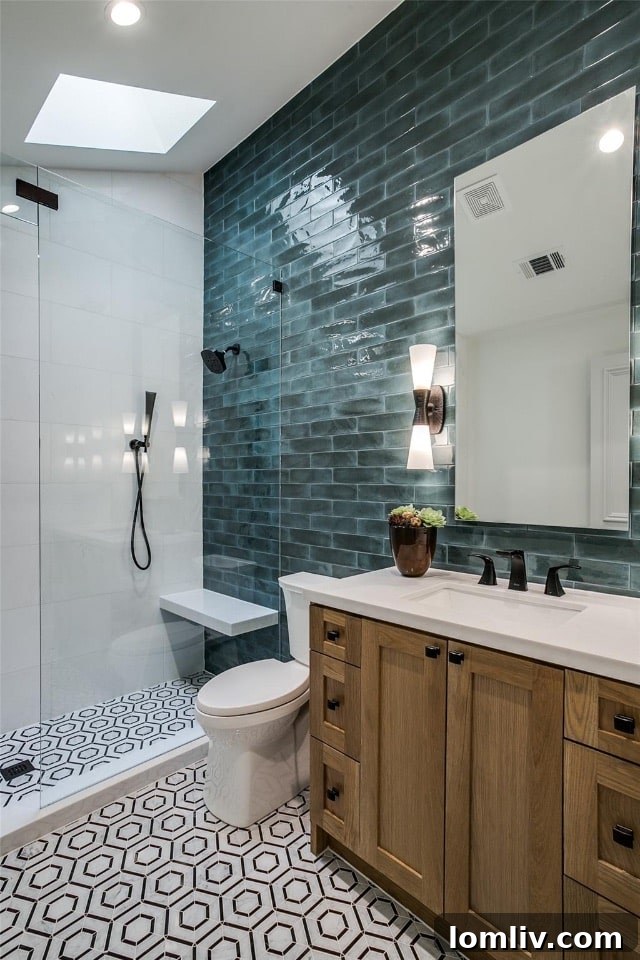 Elegant bathroom shower with varied blue tone tiles